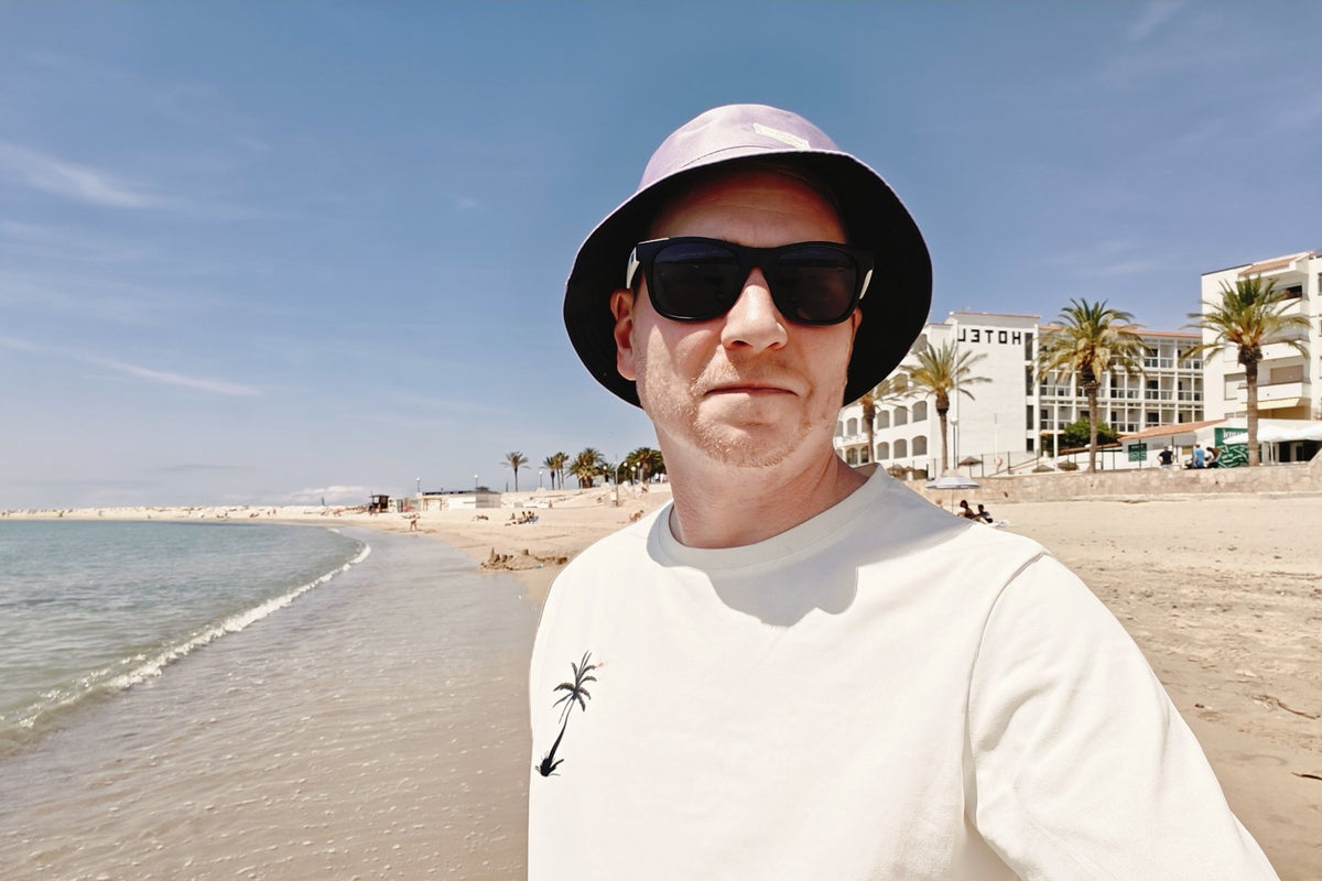 Sam from Fun Learning Spanish on a beach in Spain